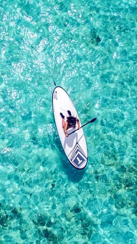 Ruta en Paddle Surf por la Reserva Marina del Norte de Menorca — Cuevas y Snorkel en Fornells